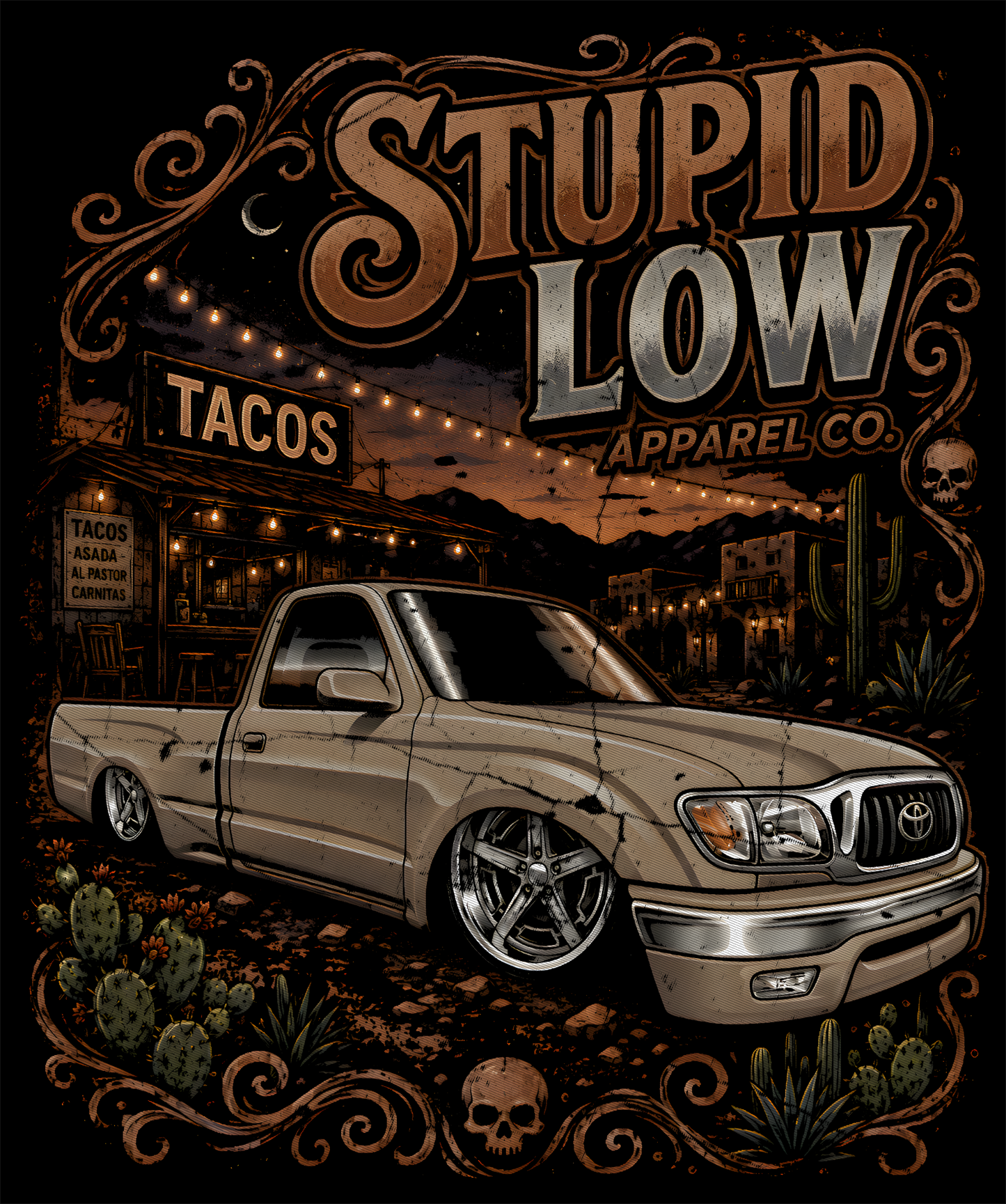 A stylized graphic print featuring a lowered beige pickup truck in a desert town scene with large text reading 'STUPID LOW APPAREL CO.' The artwork includes decorative swirls, cacti, skulls, and warm string lights against a dark background.